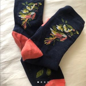 Navy ankle socks with floral design.